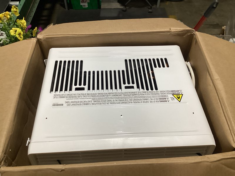 Condition photo showing As Is for 10,000 (doe) btu 115-volts window air conditioner cools 450 sq. ft. with wi-fi, remote and dehumidifier
