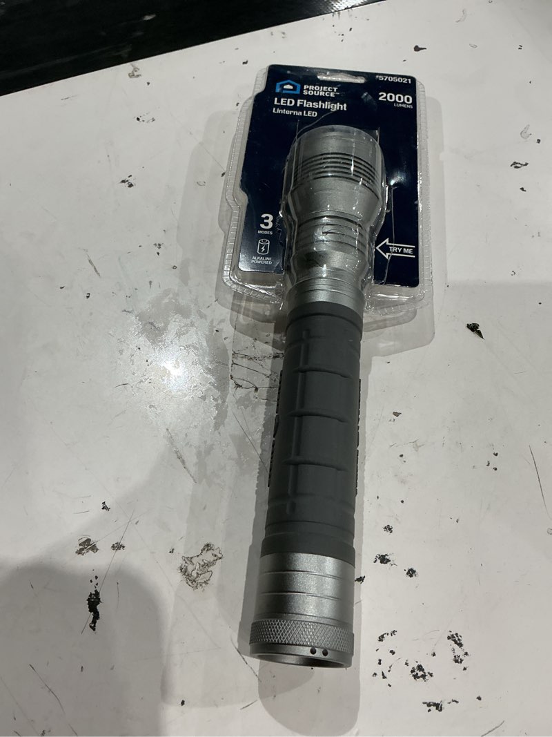 Condition photo showing As Is for project source 2000-lumen 3 modes led spotlight flashlight with batteries included
