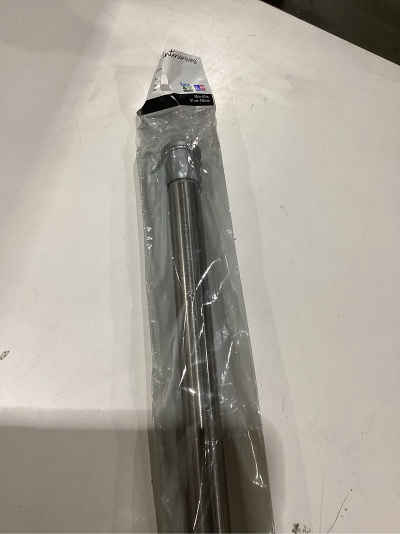 Condition photo showing New/Like New for Similar to stock photo Interior Living 36-63 in. Adjustable Standard Shower Rod, Brushed Nickel