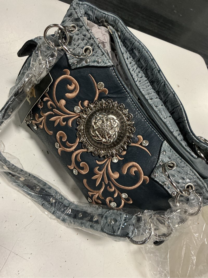 Condition photo showing Good Condition for new without tags.  -brand cowboy trendy  rough measurements of the bag.  -height 8.5  -length 15.5” (including side pockets) -width 5”  ( color charcoal )