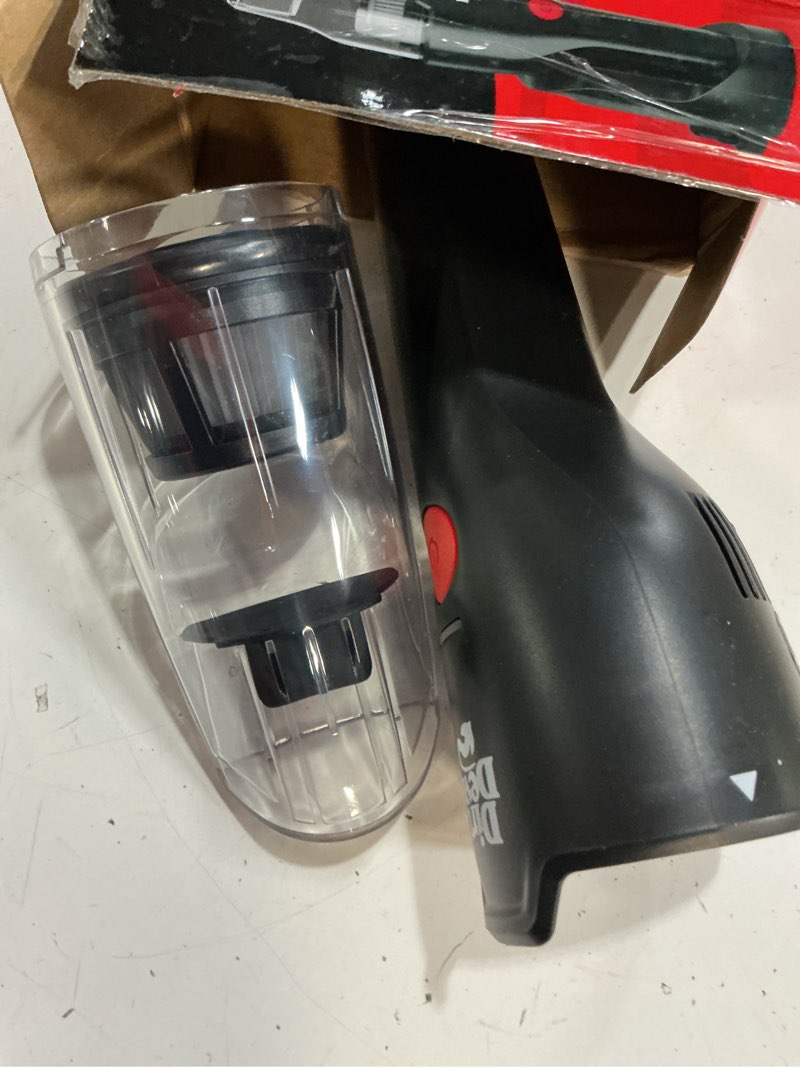 Condition photo showing As Is for dirt devil cordless handheld vacuum, 8v grab & go, for car & multi-surfaces, powerful suction, lightweight, charging stand, bd30110v, black