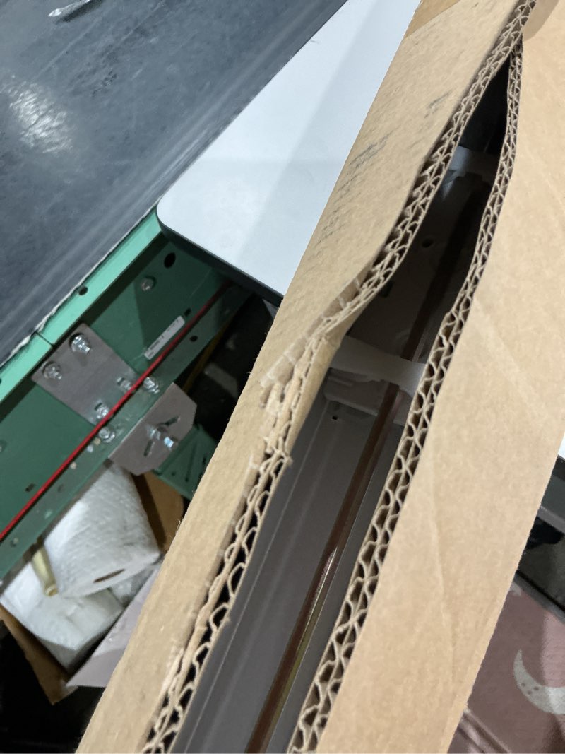 Condition photo showing Good Condition for white cordless room darkening faux wood blind with 2 in. slats - 72.5 in. w x 84 in. l (actual 72 in. w x 84 in. l)