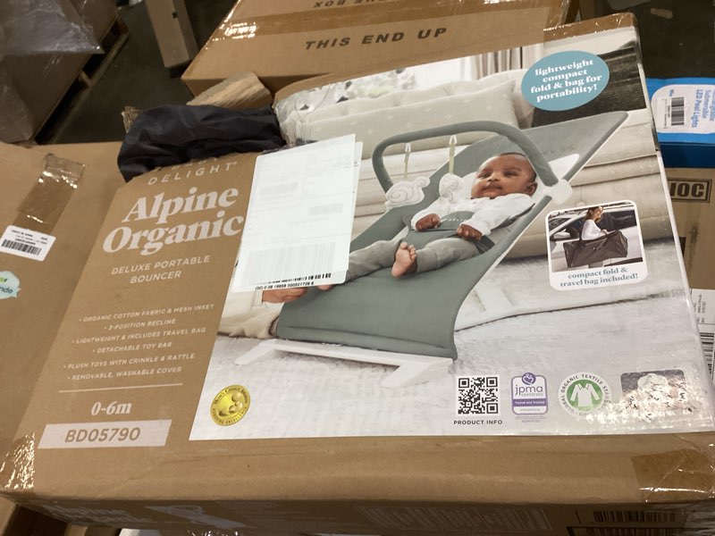 Condition photo showing New/Like New for Baby Delight Alpine Deluxe Portable Baby Bouncer | Infant | 0-6 Months | 100% GOTS Certified Organic Cotton Fabric | Organic Sage