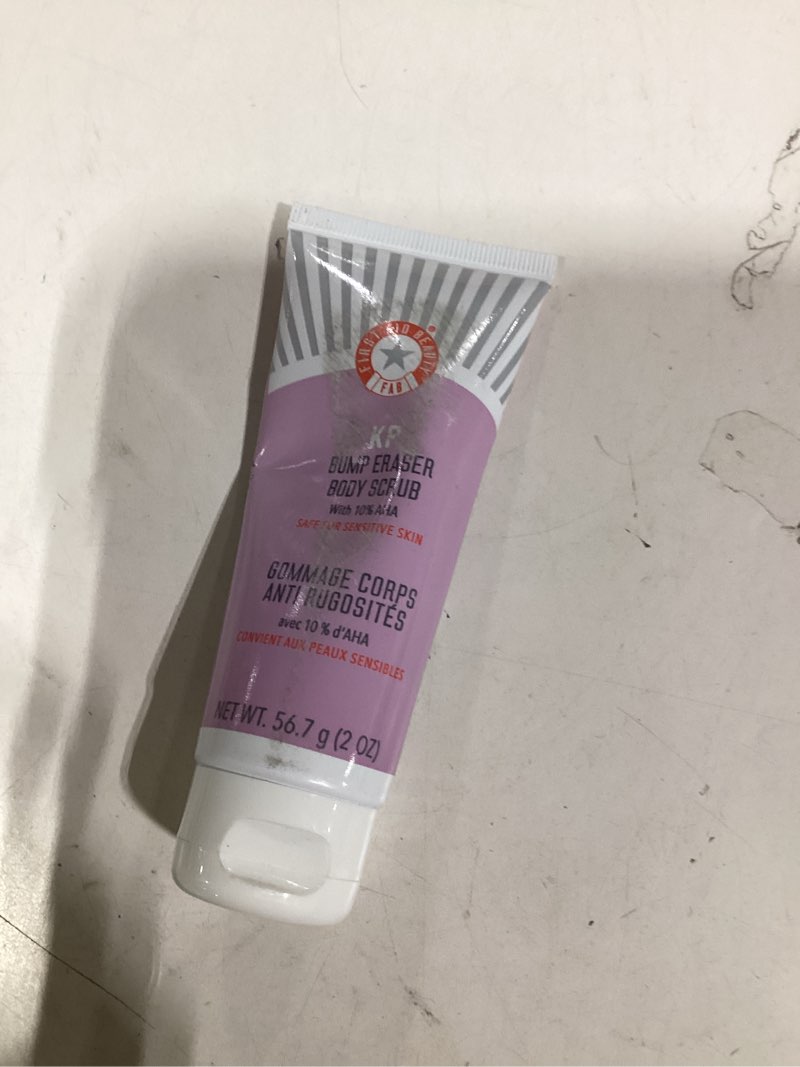 Condition photo showing As Is for First Aid Beauty - KP Bump Eraser Body Scrub with 10% AHA, Keratosis Pilaris Skin Exfoliator with Glycolic and Lactic acids, Helps Reduce Chicken Bumps, Safe for Sensitive Skin, 2 oz 2 Ounce (Pack of 1)