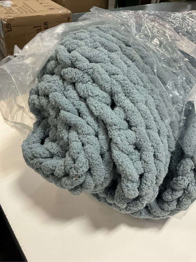 Condition photo showing Good Condition for Bigacogo Chunky Knit Throw Blanket for Couch, 51x63 inches, 100% Hand Knitted with Thick Jumbo Chenille Yarn, Cozy Soft Large Rope Knot Cable Crochet Blankets for Sofa Bed Living Room, Dusty Blue Dusty Blue 51"x63" (Large Size Throw?