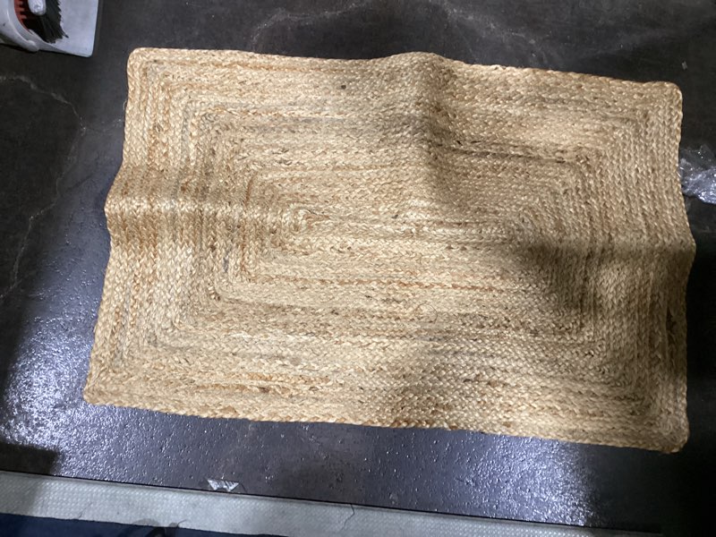 Condition photo showing Good Condition for Hausattire Hand Woven Jute Braided Rug, 2'x3' – Natural, Reversible Boho Entry Area Rugs for Kitchen, Living Room I Farmhouse Indoor Outdoor Decorative Floor Rug, 24x36 Inches 2'x3' Natural