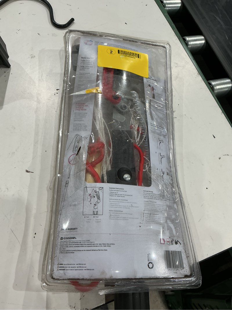 Condition photo showing As Is for corona duallink 14-ft fiberglass pole pruner