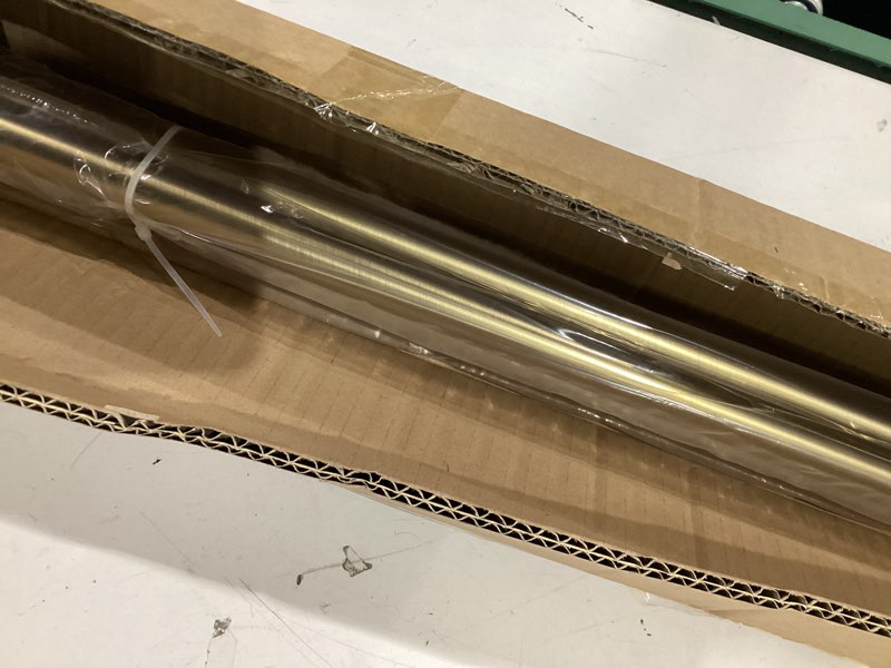 Condition photo showing Good Condition for warm gold 100-150" aluminum disc wrap around curtain rod with blackout capabilities 100-150" warm gold