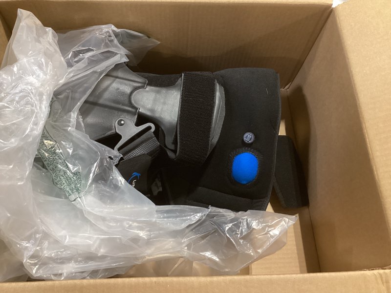 Condition photo showing As Is for united ortho short air cam walker fracture boot, extra large, black black extra large boot