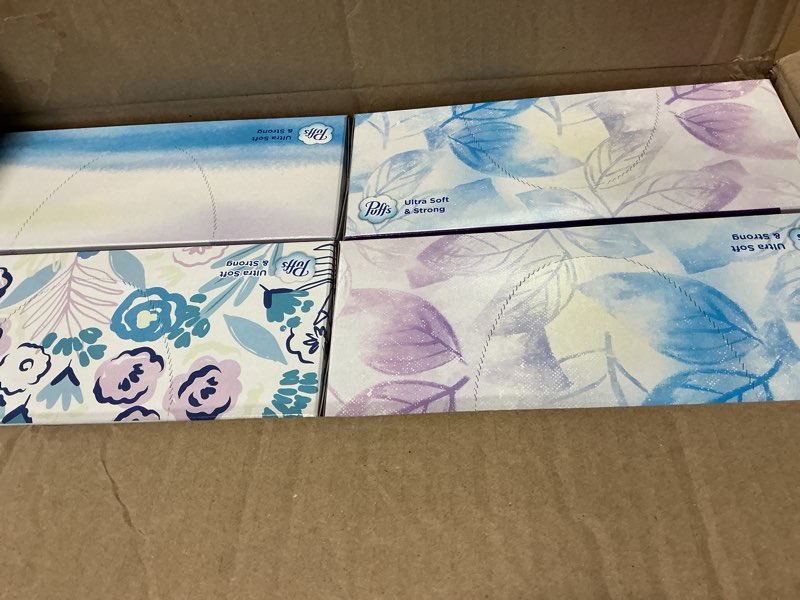 Condition photo showing New/Like New for puffs ultra soft facial tissues, 1 family size box, 124 facial tissues per box (pack of 4)