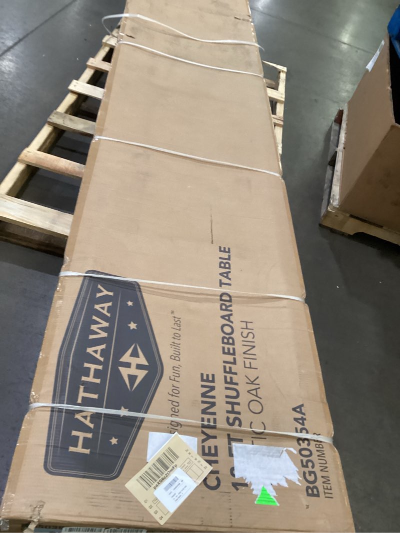 Condition photo showing As Is for hathaway cheyenne 12 ft shuffleboard table for family arcade game room - with poly-coated playfield, built-in scorer & cabinet, climate adjusters, leg levelers, 8 pucks, brush & wax – rustic oak
