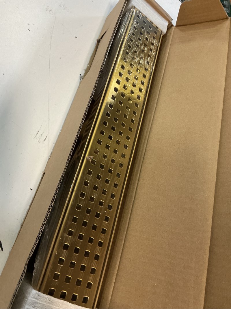 Condition photo showing Good Condition for gold shower drain, 18 inch linear shower drain with removable square hole cover grate, bathroom modern 304 stainless steel brushed gold shower floor drain with adjustable feet,hair filter brushed gold 18in