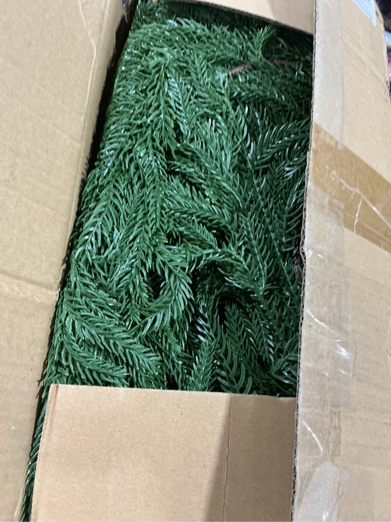 Condition photo showing Good Condition for hananona 2 pcs 9 ft artificial norfolk pine garlands, real touch winter pine garland, green artificial greenery garland for table, mantle, wall, indoor, outdoor christmas decorations (2, 9 ft) 9 ft 2