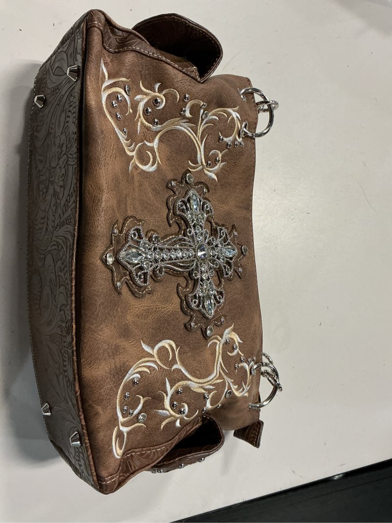 Condition photo showing New/Like New for rhinestone cross concealed carry purse western shoulder bag