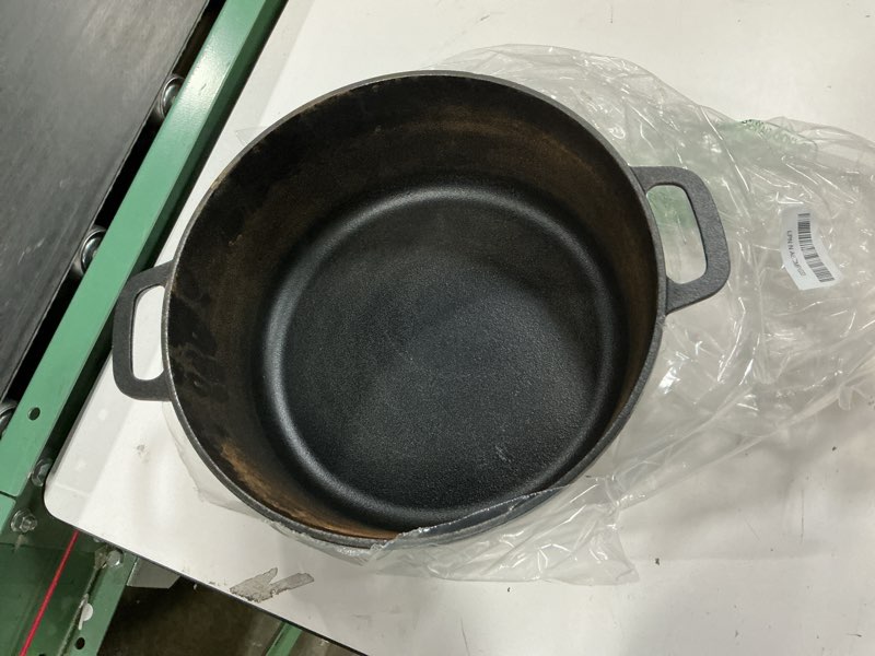 Condition photo showing As Is for amazon basics round pre-seasoned cast iron dutch oven pot with lid and dual handles, heavy-duty & large, 7-quart, black