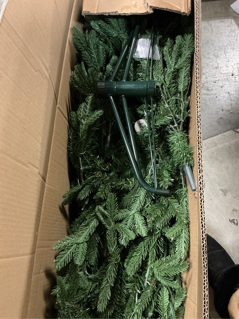 Condition photo showing Good Condition for National Tree Company 6.5 ft Pre-Lit Tiffany Fir Slim Artificial Christmas Tree, 500 Clear Lights, 1,462 Tips, Includes Stand, Green 6ft 6in Tree
