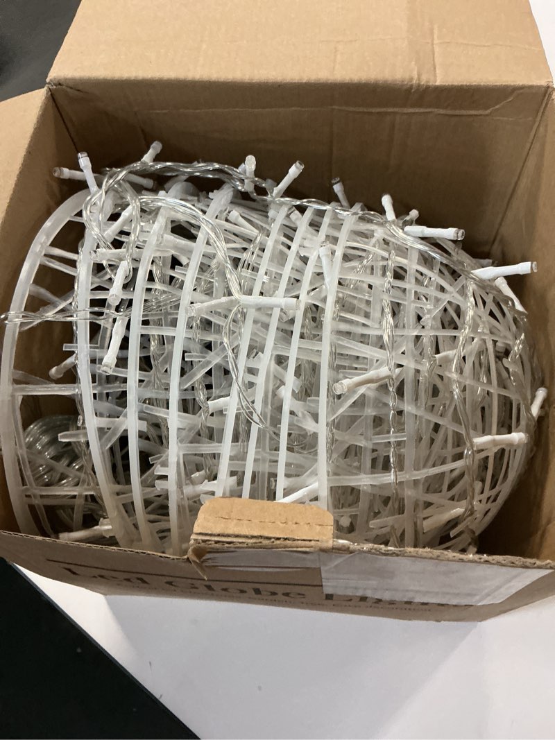 Condition photo showing Good Condition for Christmas String Lights Outdoors,4 Pack 7.98" Sphere Ball Tree Garden Globe Lights for Home, Party, Christmas, Porch Patio,Wedding, Garden,Tree Decoration with Memory Function Plug Cool White 7.87inch