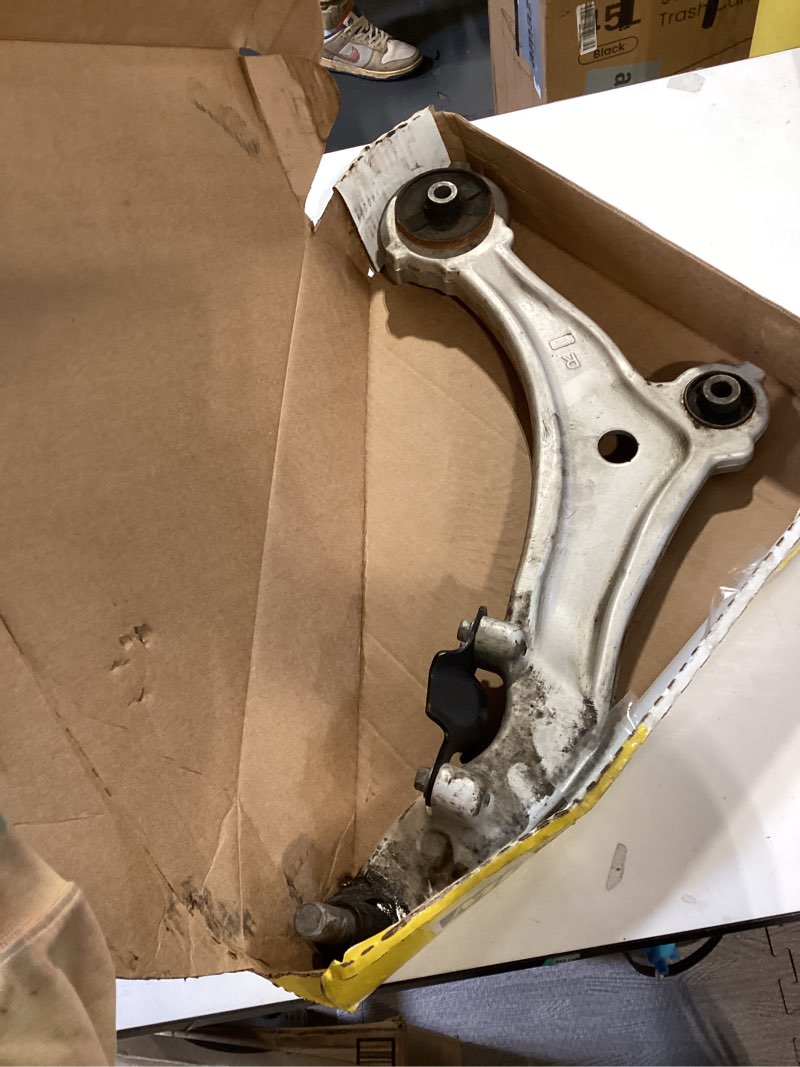 Condition photo showing As Is for moog rk620065 front right lower suspension control arm and ball joint assembly for jeep patriot