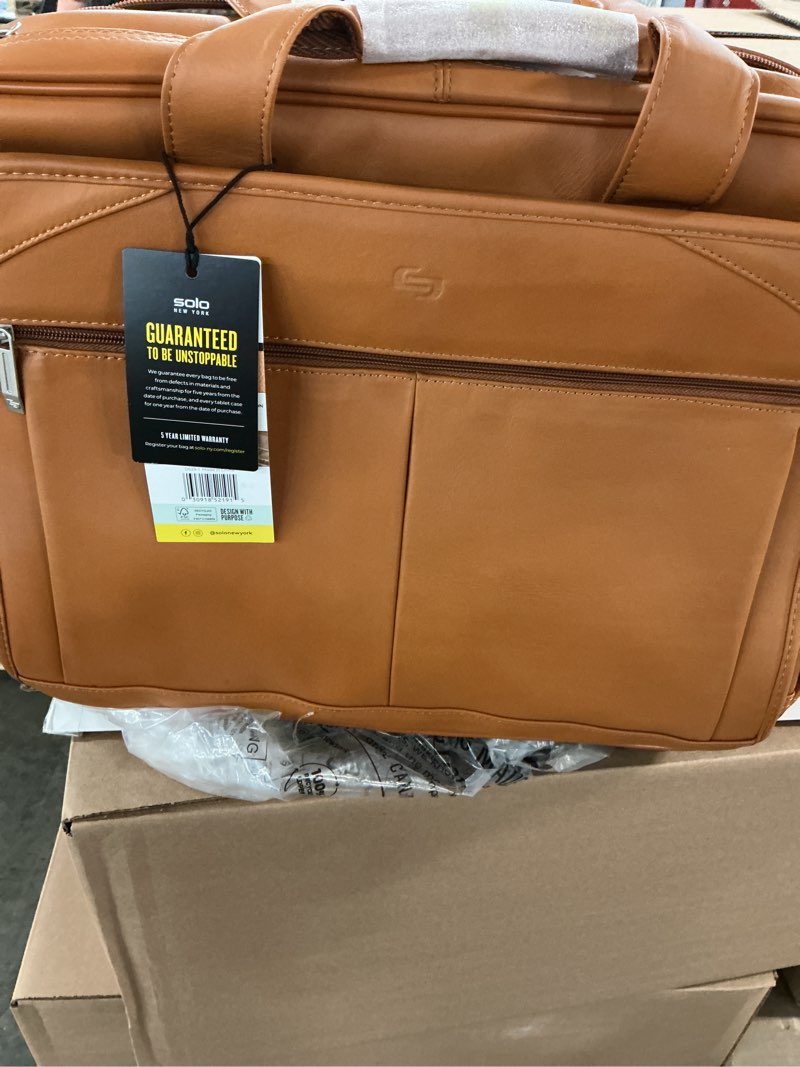 Condition photo showing New/Like New for solo new york walker leather rolling case for 15.6" laptops, tan
