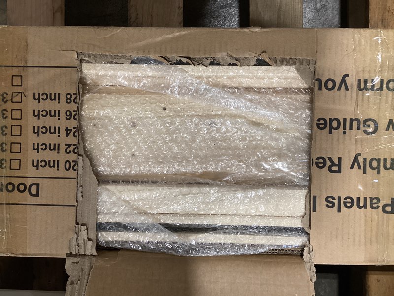 Condition photo showing As Is for SmartStandard 38in x 84in Sliding Barn Wood Door Pre-Drilled Ready to Assemble, DIY Unfinished Solid Spruce Wood Panelled Slab, Interior Single Door Only, Natural, K-Frame (Fit 6.6FT Rail)