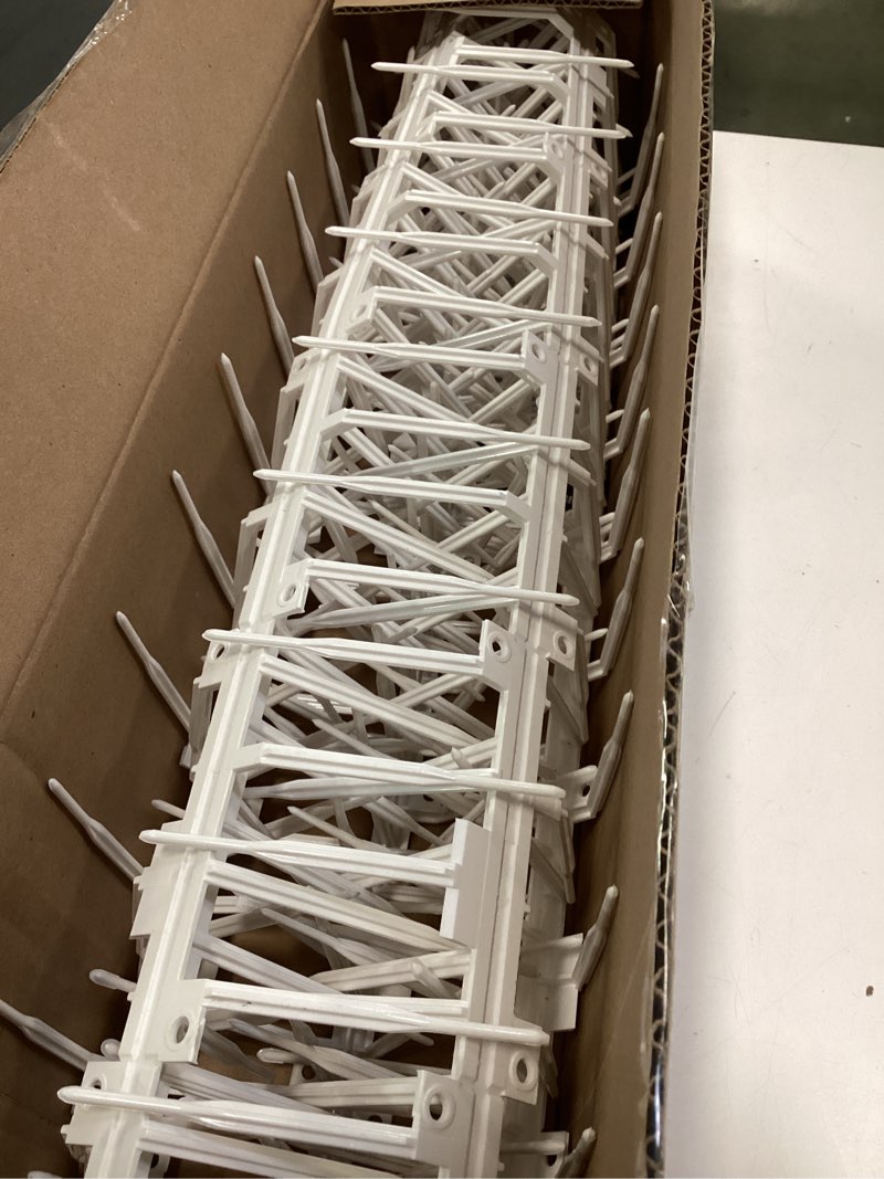 Condition photo showing Good Condition for (5 Pieces)  Bird B Gone - White Plastic Anti Bird Spikes (10') - Humane Deterrent - Stops Pigeons & Birds from Roosting - UV-Stabilized Polycarbonate - for Rooftops, Ledges, Fences, Etc - Made in USA White 10-Feet by 7-Inch