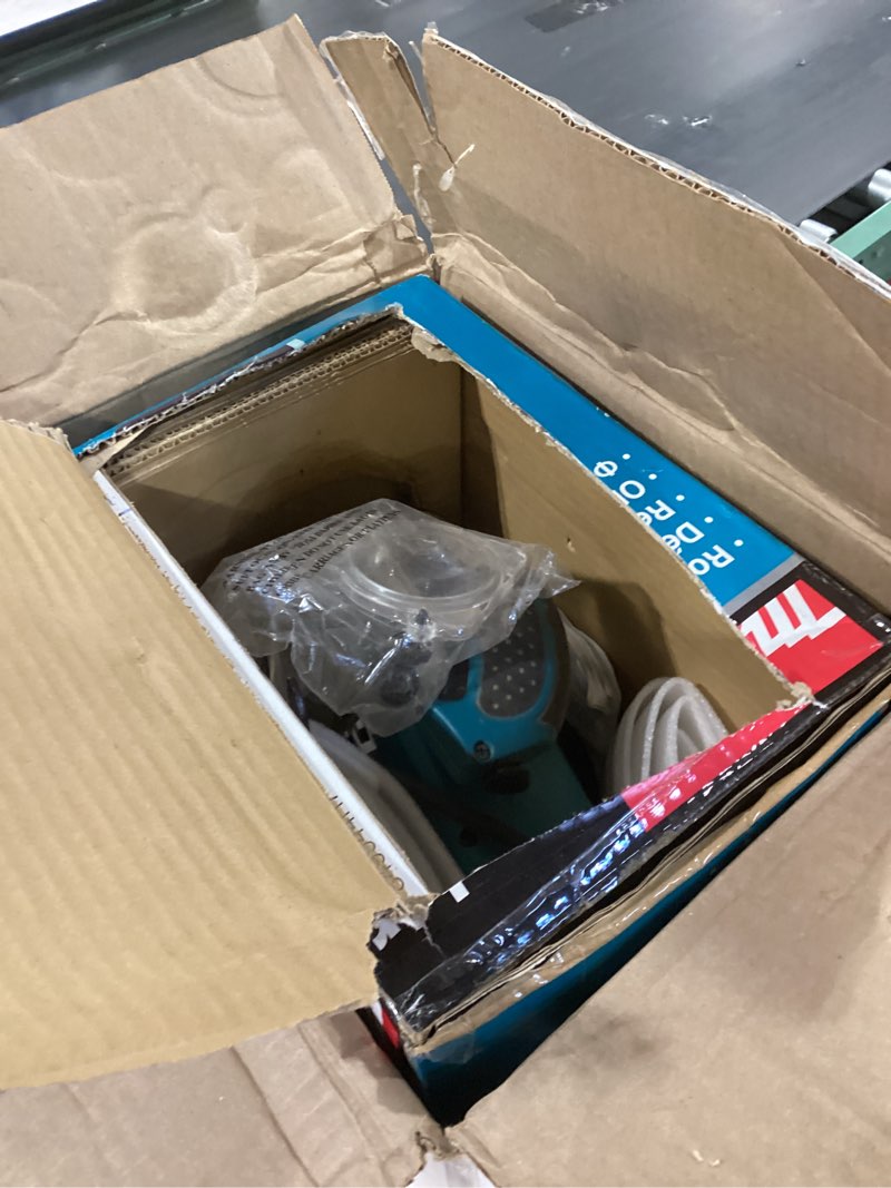 Condition photo showing As Is for makita rp2301fc 3-1/4 hp* plunge router, with variable speed