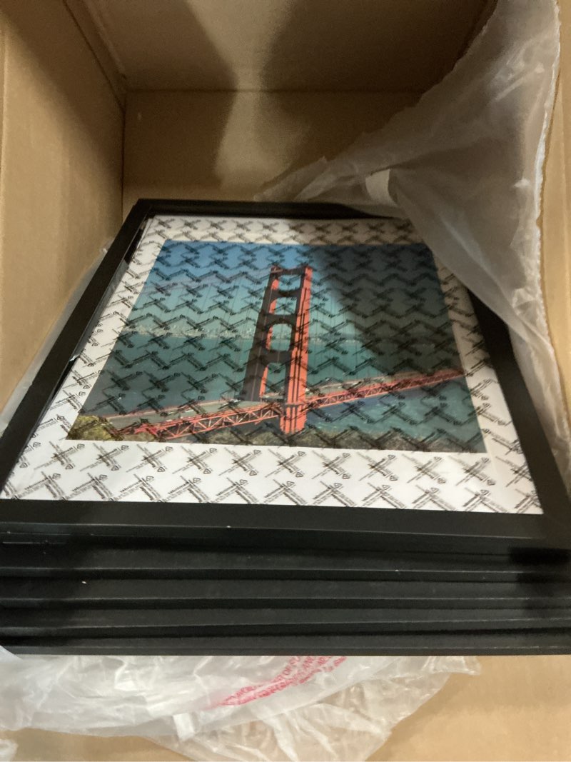 Condition photo showing As Is for poster frame, 24\"x24\" poster size, aluminum, 1 inch profile, mitered corners, black pack of 6