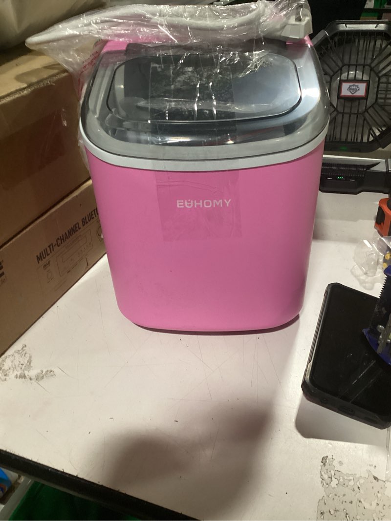 Condition photo showing As Is for euhomy countertop ice maker machine with handle, 26lbs in 24hrs, 9 ice cubes ready in 6 mins, auto-cleaning portable ice maker with basket and scoop, for home/kitchen/camping/rv. (pink)