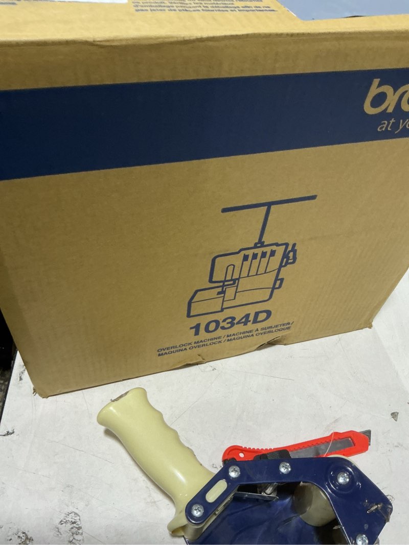 Condition photo showing Good Condition for Brother Serger, 1034D, Heavy-Duty Metal Frame Overlock Machine, 1,300 Stitches Per Minute, Removeable Trim Trap, 3 Included Accessory Feet, White