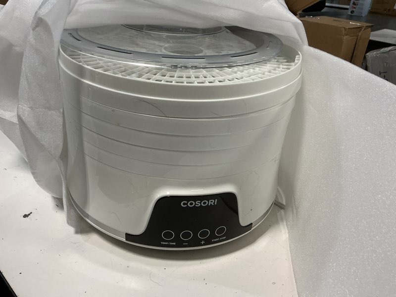 Condition photo showing As Is for COSORI Food Dehydrator Machine for Jerky, 5 Trays with 165°F Temperature Control and 48H Timer, 350W Dryer for Fruit, Herbs, Meat, Veggies and Dog Treats, 50-Recipes Book Included 5 Trays Expandable to 7 Trays White