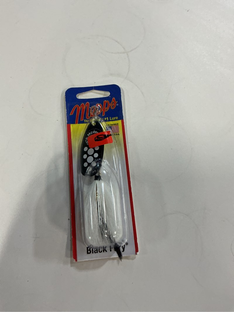 Condition photo showing New/Like New for mepps black fury dressed lure