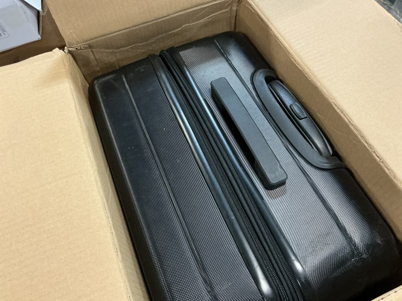 Condition photo showing Good Condition for Amazon Basics 30" Hardside Large Checked Luggage, Hardshell Suitcase With Wheels, Expandable For Up to 15% More Space, With Scratch-Resistant Surface, Four Multi-directional Wheels, Black Black Large Checked