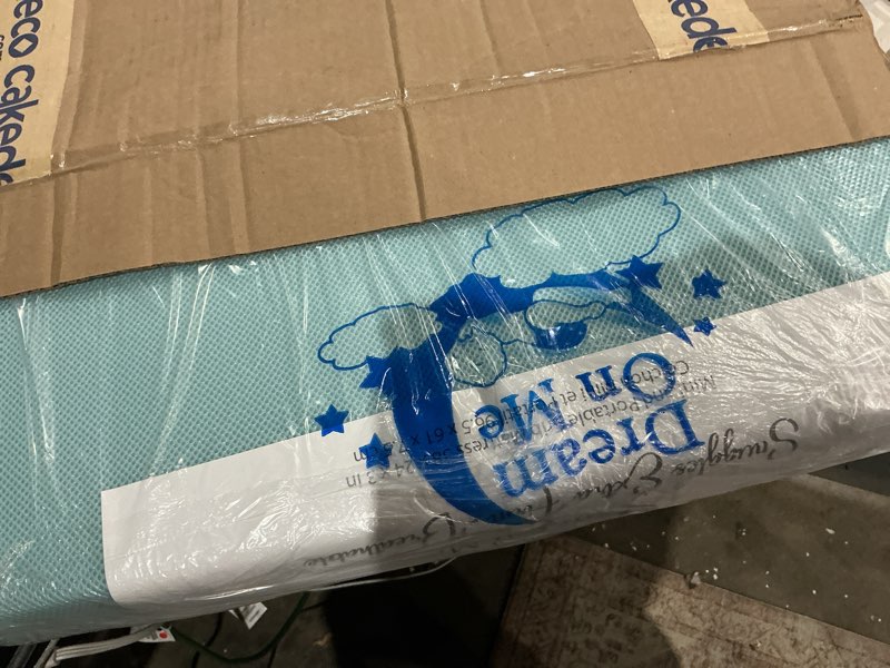 Condition photo showing Good Condition for dream on me snuggles extra firm dual-sided baby crib mattress with breathable fabric, water & odor resistant, greenguard gold certified, fits mini & portable cribs (38”x 24”x 3”) - blue mist