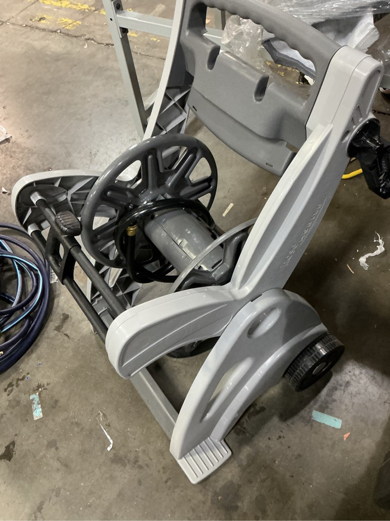 Condition photo showing As Is for suncast hosecart plastic 200-ft cart hose reel