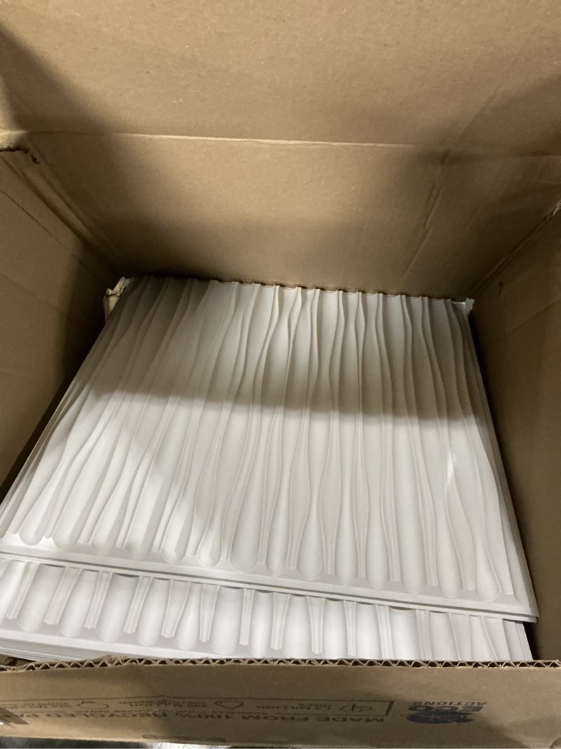 Condition photo showing Good Condition for Art3dwallpanels Ceiling Tiles 24 x 24 for Interior Wall Décor, 12 Pack Drop Ceiling Tile 3D Wall Panel Fire Rated Waterproof Premium PVC, No Sag and Breakage Wall Panels Cover 48.Sq.Ft. White 12 Pack Wave White