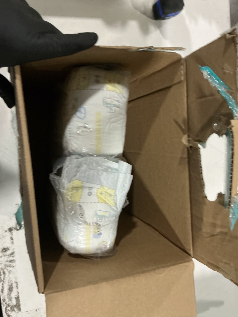 Condition photo showing As Is for pampers swaddlers newborn diapers, size newborn (10 lbs), 140 count, fragrance free, hypoallergenic, absorbent, pediatrician recommended, skin safe newborn 140