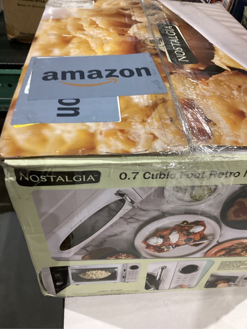 Condition photo showing As Is for Nostalgia Retro Microwave Oven - 0.7 Cu Ft, 700-Watt Countertop Size with Glass Turntable, Child Safety Lock, 8 Auto-Cook Programs, Digital Clock - White Retro 0.7 Cu. Ft. White