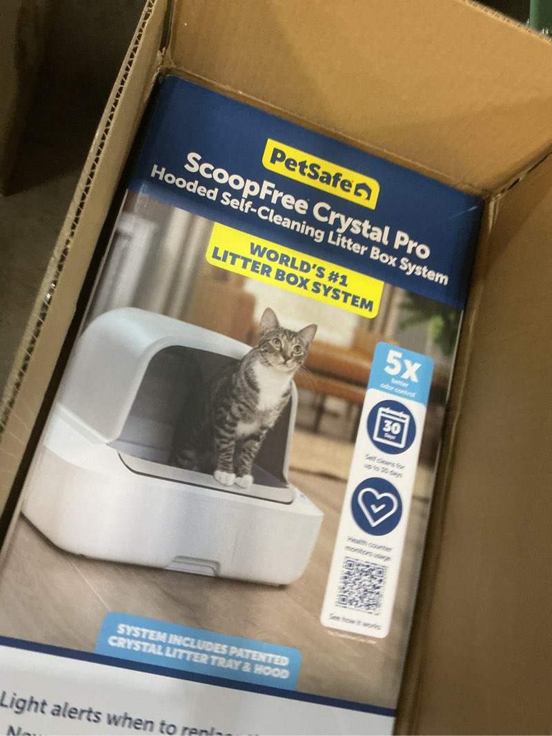 Condition photo showing New/Like New for petsafe scoopfree crystal pro self-cleaning cat litter box system – enclosed front-entry – advanced odor control – includes 1 disposable crystal litter tray – white (pal00-18017) covered white