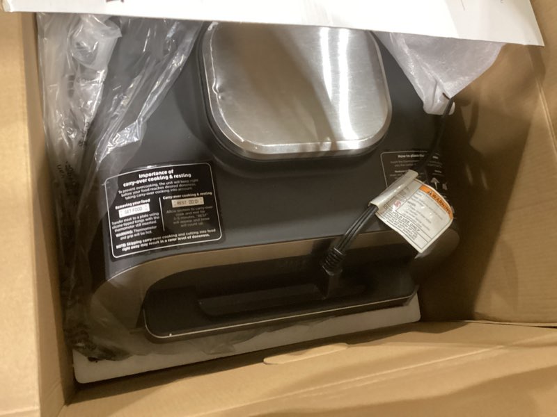 Condition photo showing Good Condition for Ninja DG551 Foodi Smart XL 6-in-1 Indoor Grill with Air Fry, Roast, Bake, Broil, & Dehydrate, Foodi Smart Thermometer, 2nd Generation, Black/Silver 6-in-1 With Thermometer