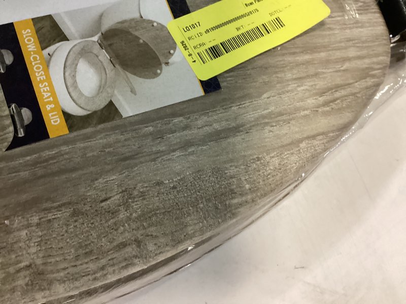 Condition photo showing As Is for home+solutions distressed grey wood elongated vaneer toilet seat elongated grey wood