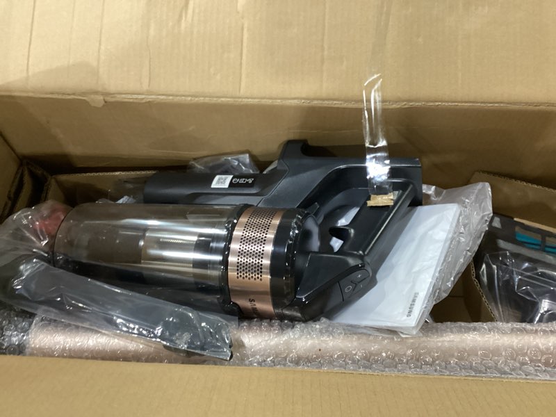 Condition photo showing As Is for Not Tested ***SAMSUNG Jet 60 Pet Cordless Stick Vacuum Cleaner w/ Removable Battery, Advanced Floor Cleaning, Jet Fit Brush to Clean Hardwood, Carpet and Tile, Lightweight Design, VS15A6032R7, Rose Gold