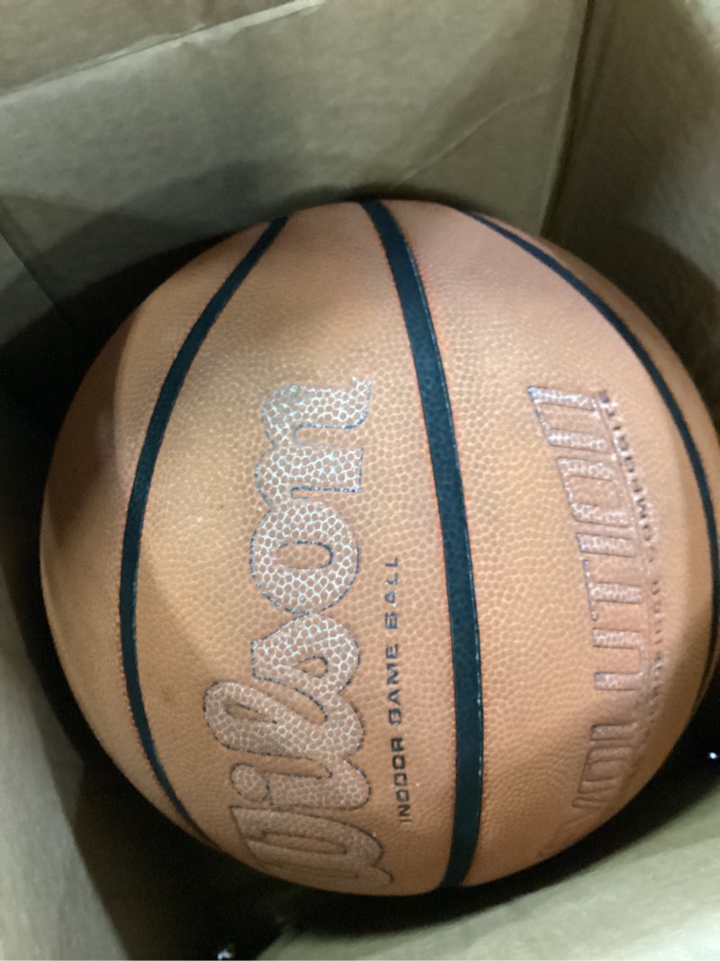 Condition photo showing As Is for wilson evolution basketballs green/brown size 7 - 29.5"