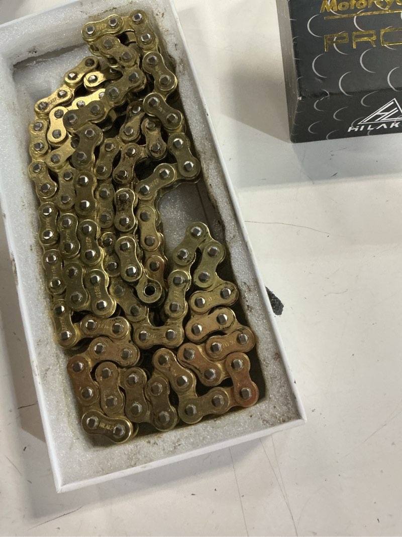 Condition photo showing As Is for 428h motorcycle chain 122 links, heavy duty reinforced drive chain, rust-resistant, pre-oiled, standard non o-ring, includes 4pcs master link