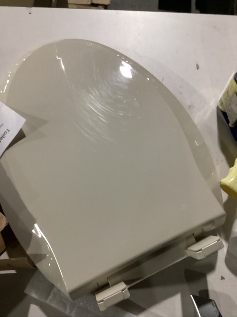 Condition photo showing Good Condition for Toilet Seat, Elongated Toilet Seat with Toddler Seat Built in, Potty Training Toilet Seat Elongated Fits Both Adult and Child, with Slow Close and Magnets- Elongated Almond Almond Elongated With Toddler Seat