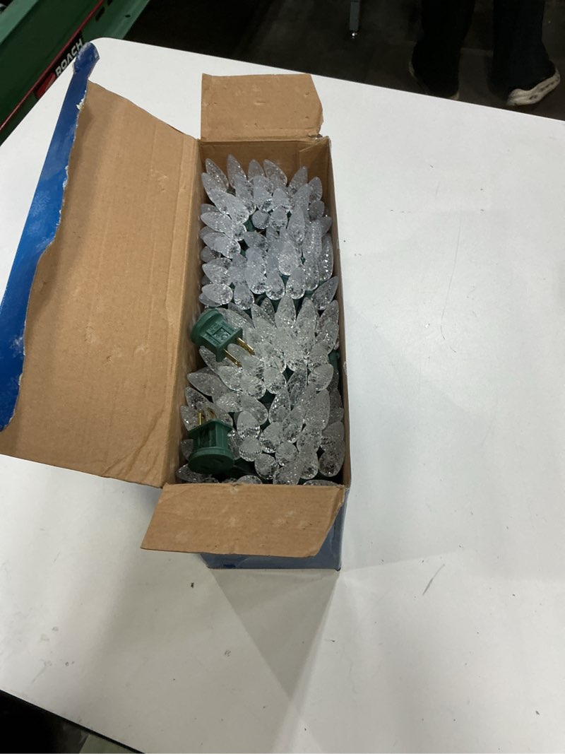 Condition photo showing New/Like New for sylvania 300 lt led warm white c6 christmas lights. green wire. 37.25' lighted length per string 300 (2x150) lt