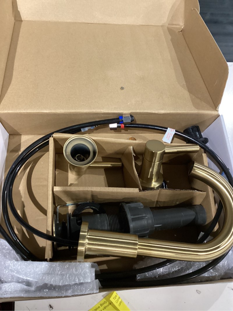 Condition photo showing As Is for moen brushed gold cia widespread 2-handle high-arc bathroom faucet , 3-hole bathroom sink faucet, valve required, t6222bg