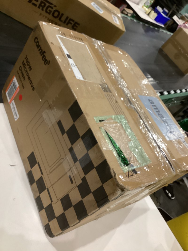 Condition photo showing As Is for COMFEE' EM720CPL-PMB Countertop Microwave Oven with Sound On/Off, ECO Mode and Easy One-Touch Buttons, 0.7cu.ft, 700W, Black 0.7 Cu.Ft Black