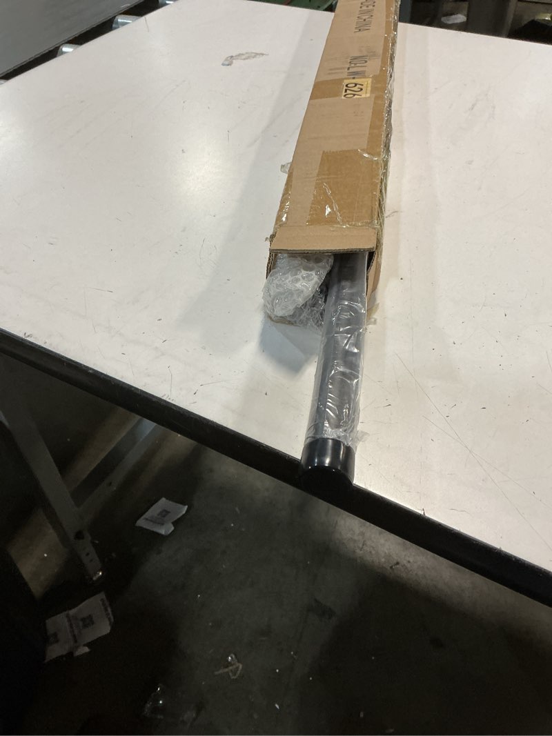 Condition photo showing Good Condition for black aluminum 48-88" wrap around curtain rod with 1 inch diameter, 50 lbs weight capacity, blackout, adjustable, wall mounted 48-88" black