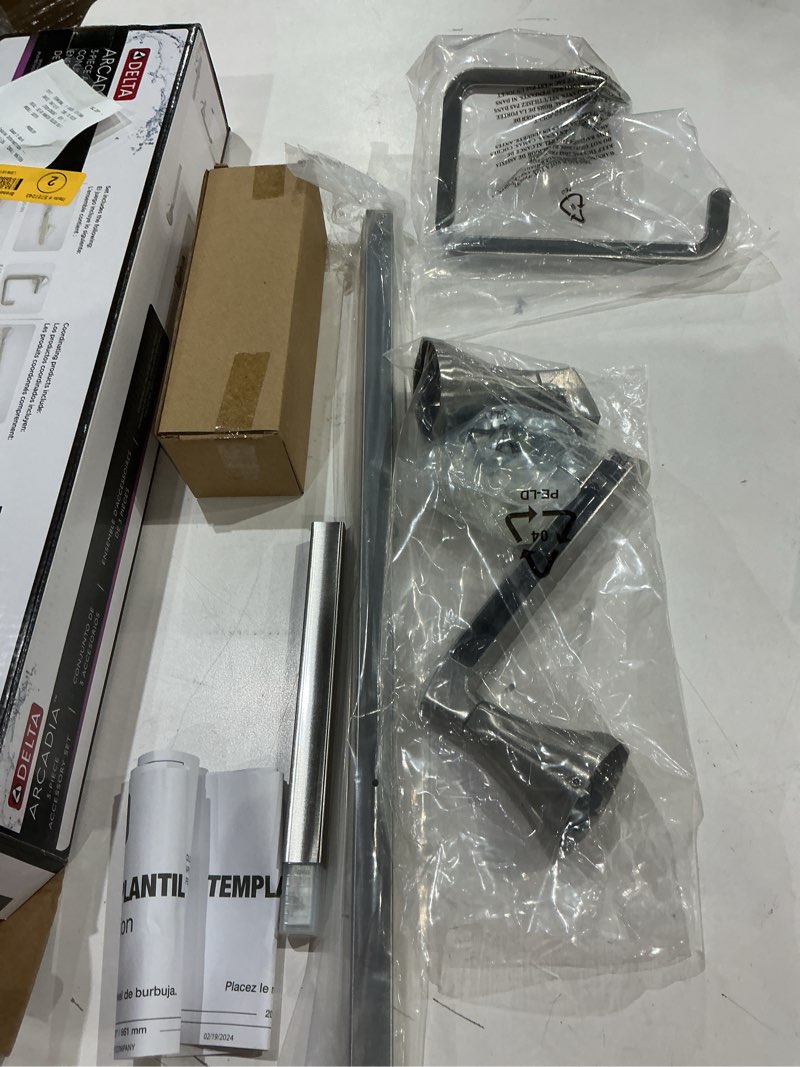 Condition photo showing Good Condition for delta 3-piece arcadia spotshield brushed nickel decorative bathroom hardware set with towel bar,toilet paper holder and towel ring