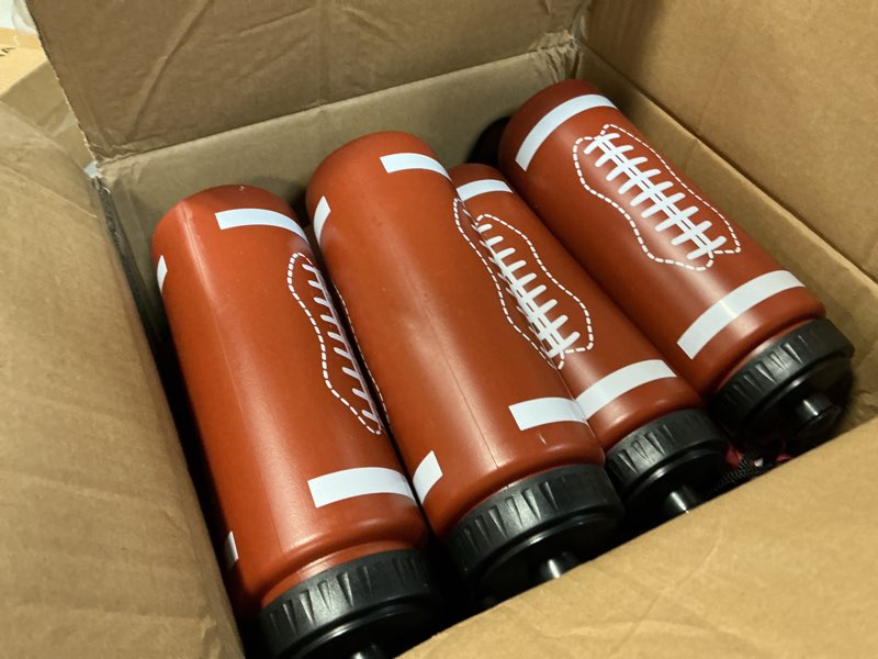Condition photo showing As Is for Denylo pro 18 Sets Football Water Bottle with Football Drawstring Bag Set Plastic Brown Water Bottles for Rugby Player Sport Gym Party Favor